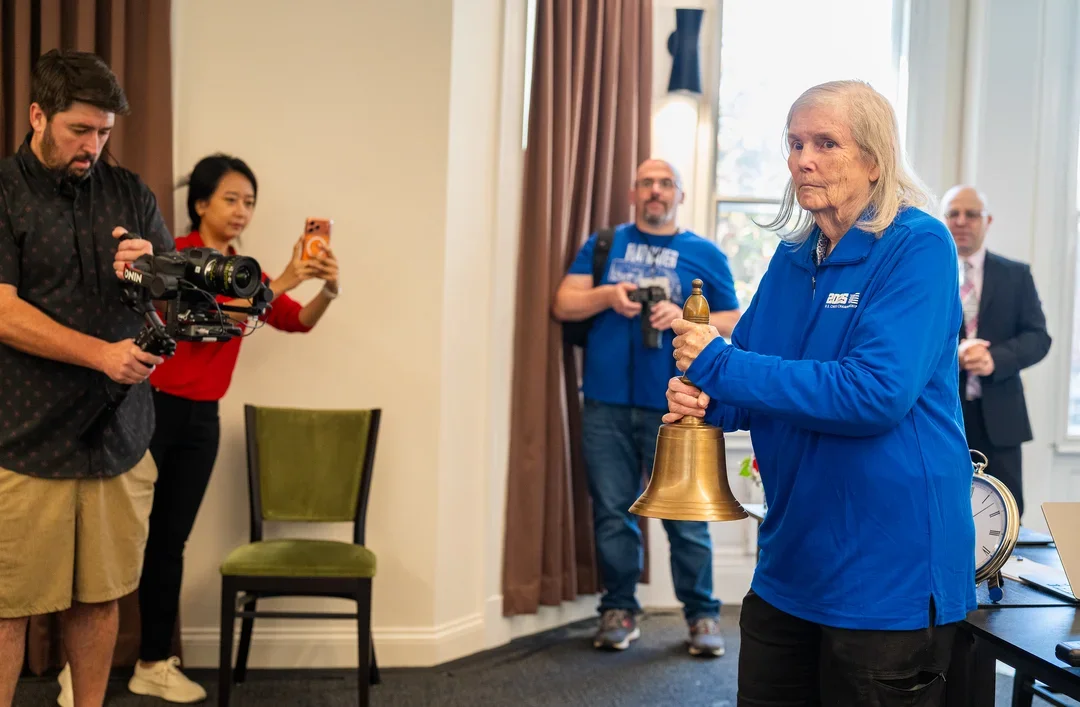 Jeanne Sinquefield rings the bell