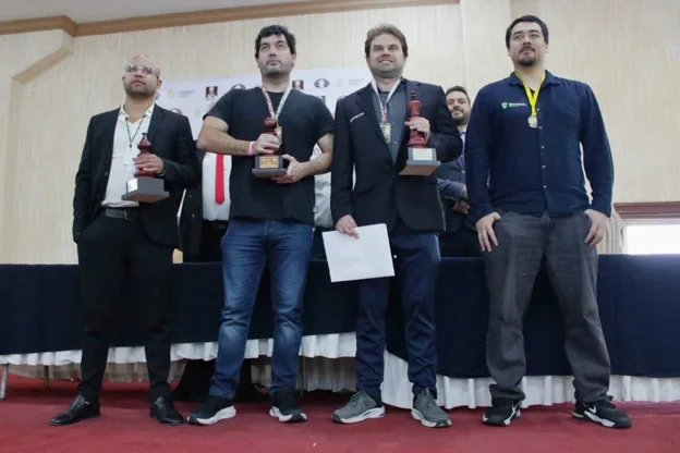 World Cup qualifiers Sam Shankland (center-right), Sandro Mareco (center-left), Alexandr Fier (right), and Juan Obregon (left) (Credit: FIDE Americas)