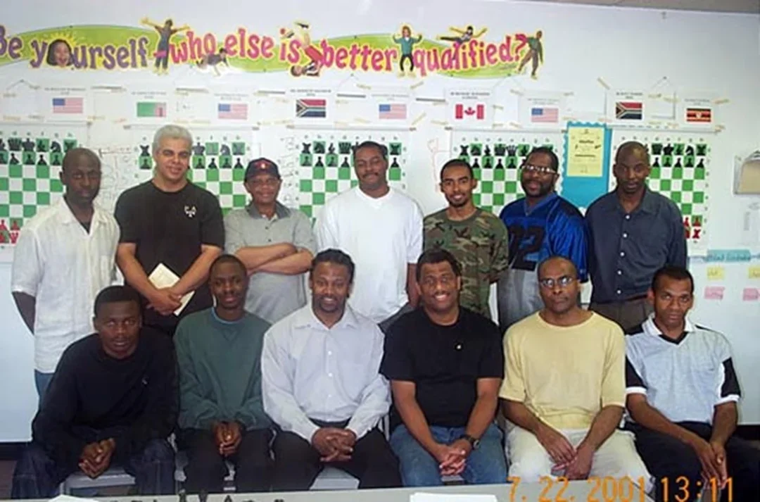 Seated (L-R):&nbsp;IM Amon Simutowe,&nbsp;NM Grace Nsubuga,&nbsp;GM Maurice Ashley&nbsp;(commentator),&nbsp;FM Ronald Simpson,&nbsp;IM Michael Schleifer,&nbsp;FM Stephen Muhammad. Standing (L-R):&nbsp;NM Jerald Times&nbsp;(commentator),&nbsp;NM Ernest Colding,&nbsp;IM Watu Kobese,&nbsp;FM William Morrison,&nbsp;FM Kenny Solomon,&nbsp;NM Norman Rogers,&nbsp;NM Elvin Wilson&nbsp;(commentator). Photo by Daaim Shabazz.