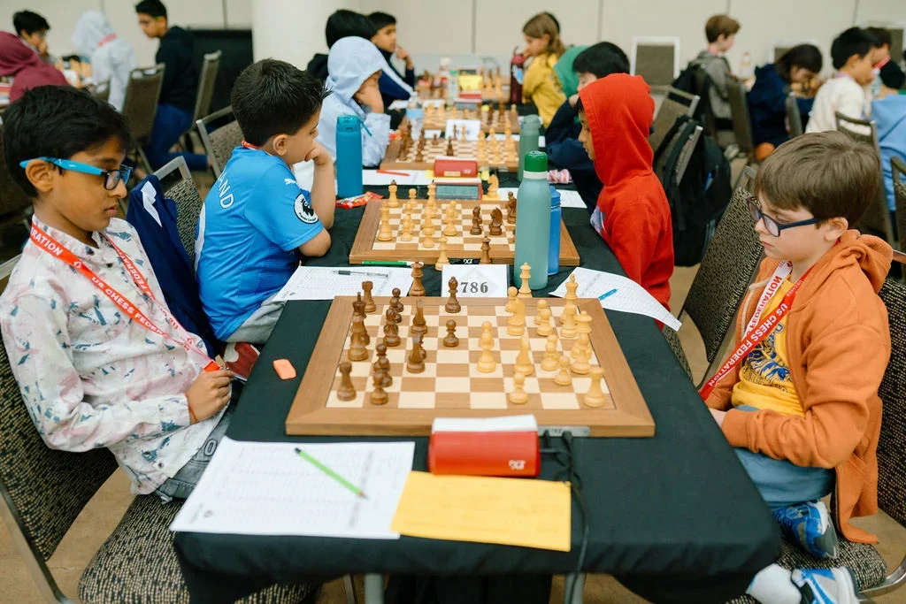 Devansh Vellanki (L) against Jacob King. (Photo by Caroline King)