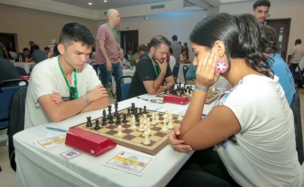 IM Josiah Stearman (L) earned his second GM norm (courtesy Federación Dominicana de Ajedrez)