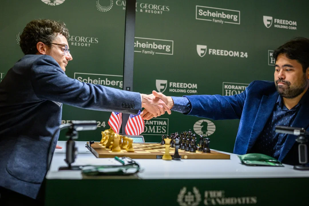 Caruana Nakamura handshake