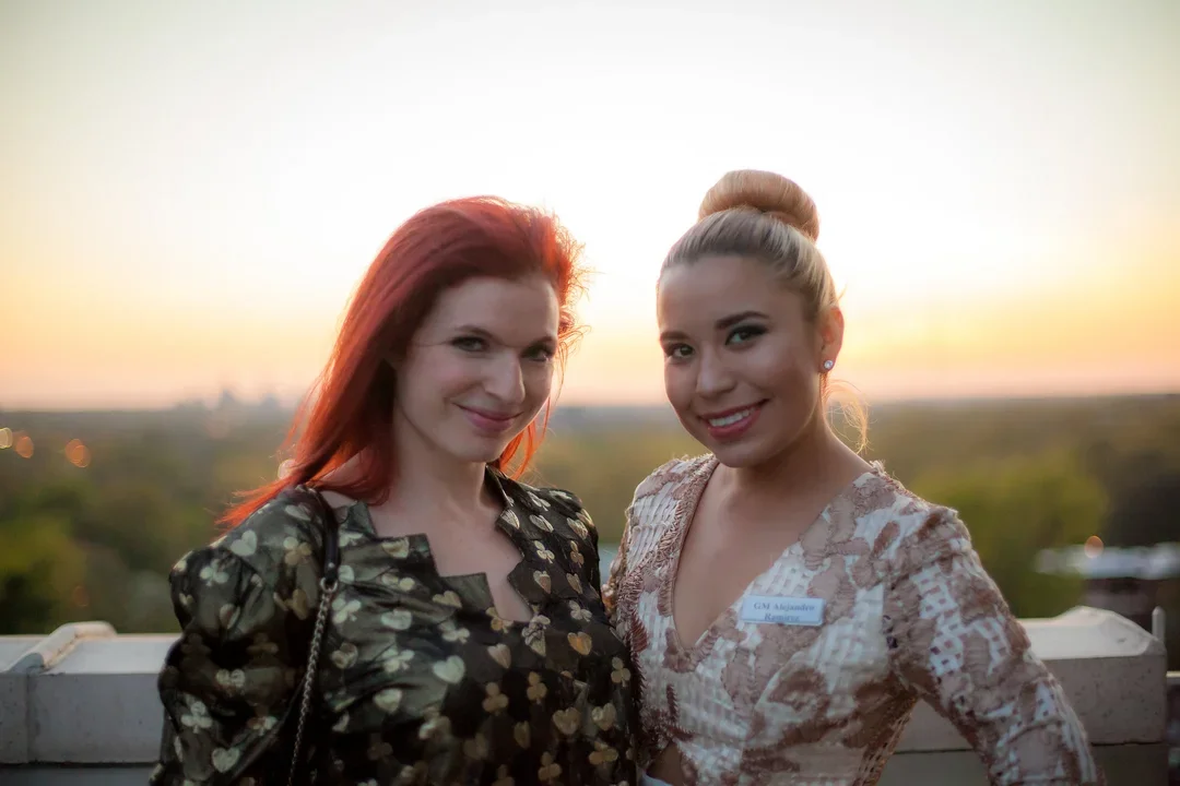 Jen and Ivette with sunset in STL