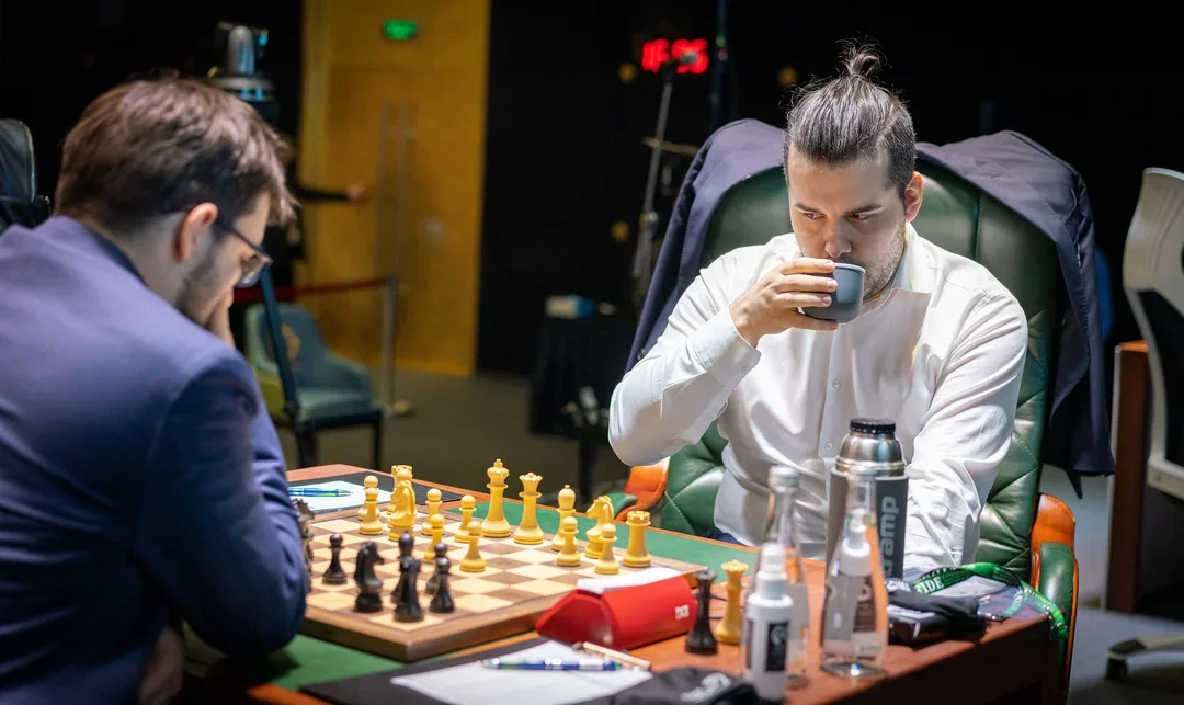 GMs Ian Nepomniachtchi and Maxime Vachier-Lagrave play in the 13th round of the 2020-21 FIDE Candidates Tournament. // photo credit Lennart Ootes, FIDE