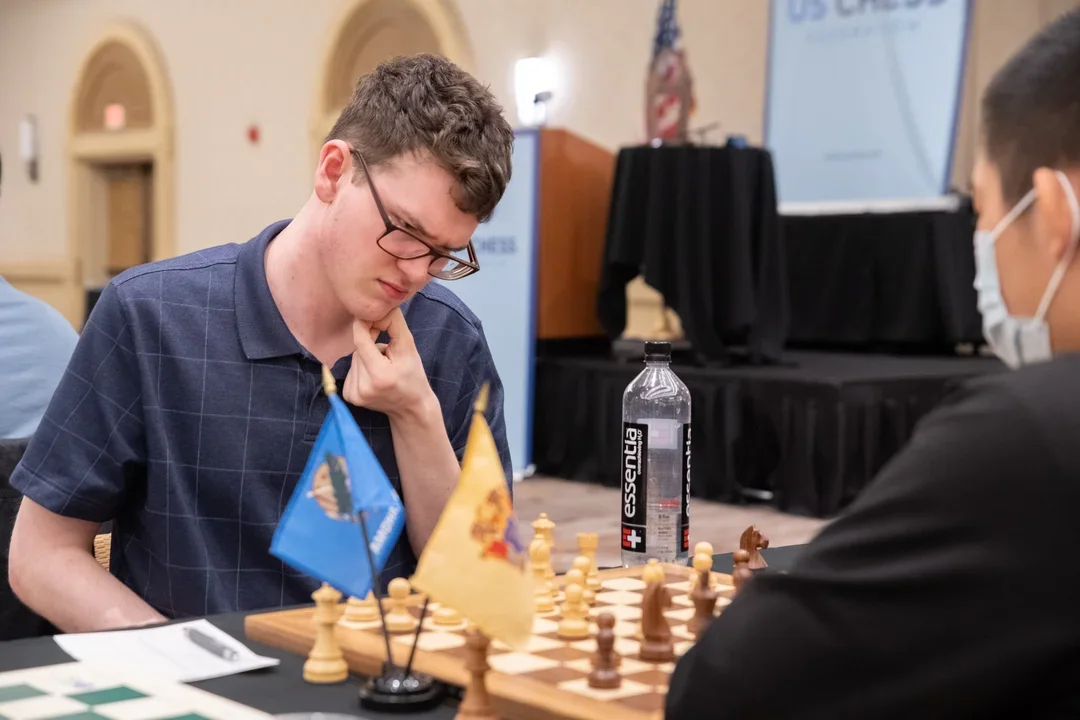 FM Ryan Amburgy gives it a think against IM Eddy Tian during the 2022 U.S. Open. Photo: Mark Cieslikowski
