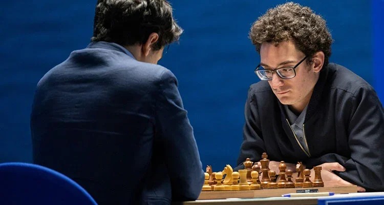 GMs Fabiano Caruana and Aryan Tari in the final round of the 2021 Tata Steel Masters Tournament