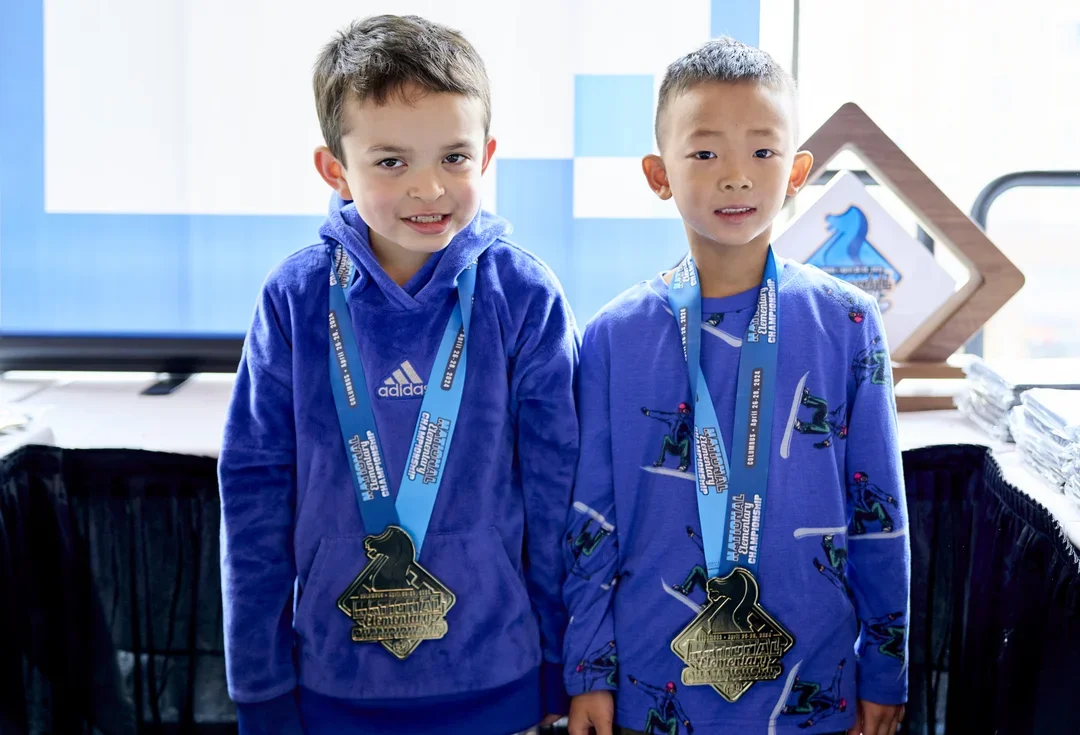 Tommy kozlek (L) and Leon Li are both only in the second grade, but won the K-6 Bughouse tournament (Photo Caroline King)