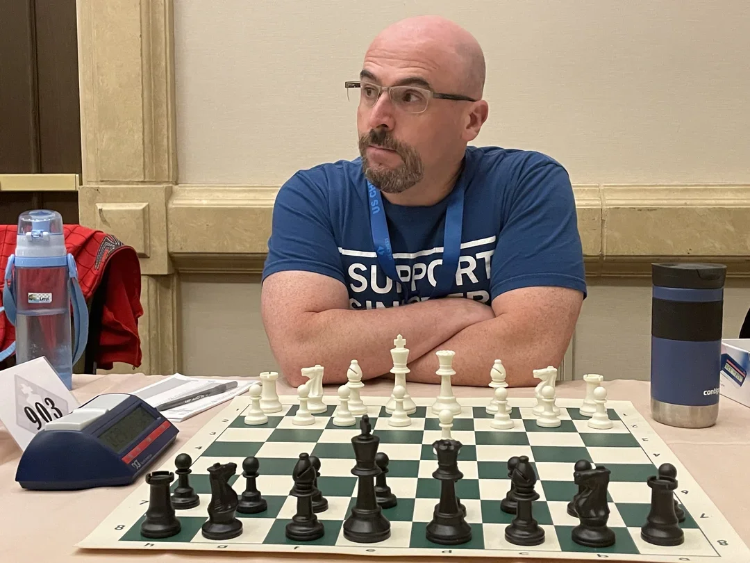 Chess Life editor John Hartmann awaiting his next opponent at the 2022 U.S. Open Quads event. Photo: Dan Lucas