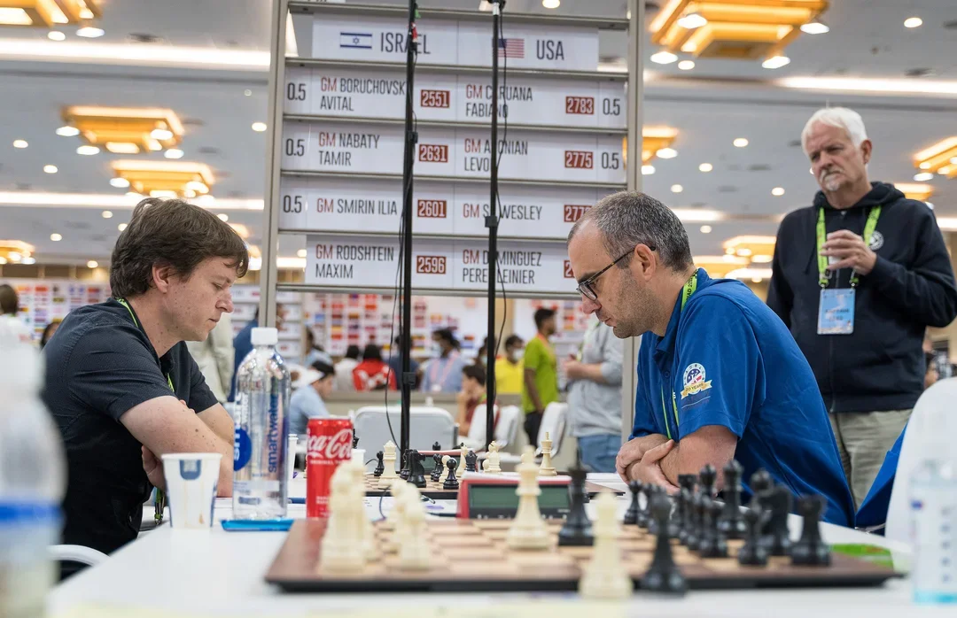 GM Lenier Dominguez (right) squaring off against GM Maxim Rodshtein in round 5 of the 2022 FIDE Olympiad. Photo: Ootes