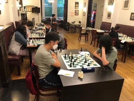 Campers playing out positions in training games at the 53rd U.S. Chess School. Photo: Eugene Yoo