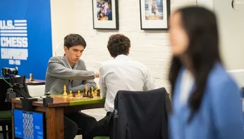 Woodward confidently moves against Caruana as Lee blurs by. (Photo courtesy SLCC/Lennart Ootes)