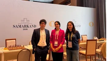 Chavez (L) with Sector Arbiter IA Najla Krifa (c) and assistant Diyora.