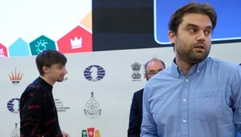 Shankland with Dubov, disappointed, in background