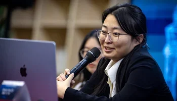 Ju Wenjun smiling in her post-game interview after round 6