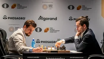 Carlsen and Nepomniachtchi at the board, Round 2, 2021 WCh