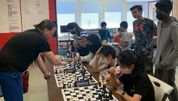 GM Jacob Aagaard conducting a 1-on-4 blitz simul at the 54th U.S. Chess School.