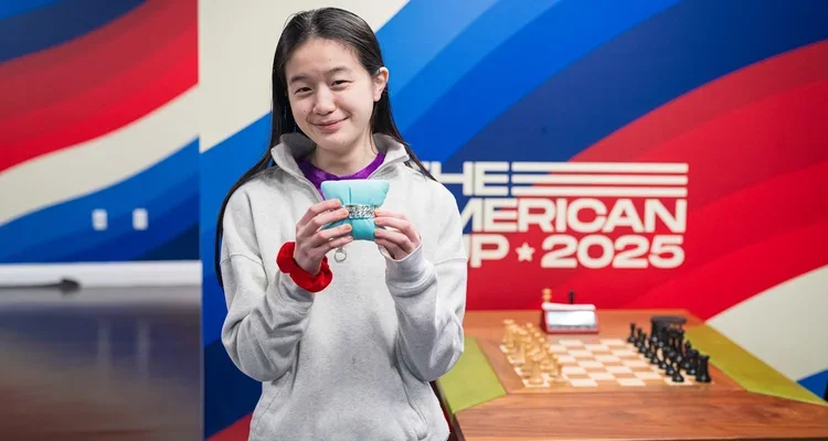 Alice Lee poses after her victory