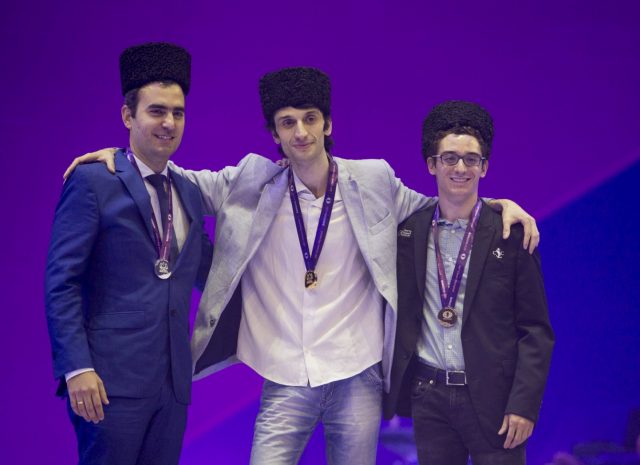 Fabiano Caruana winning the bronze medal for board 1 with gold and silver winners, Baadur Jobava and Perez Leinier Dominguez. Photo: Maria Emelianova, Official Website