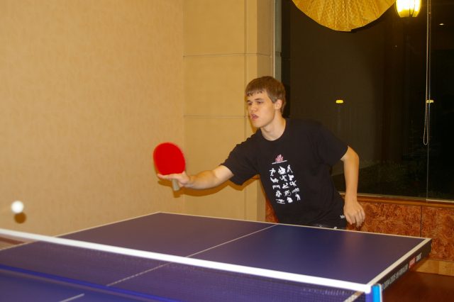 Magnus Carlsen playing table tennis. Photo: Cathy Rogers