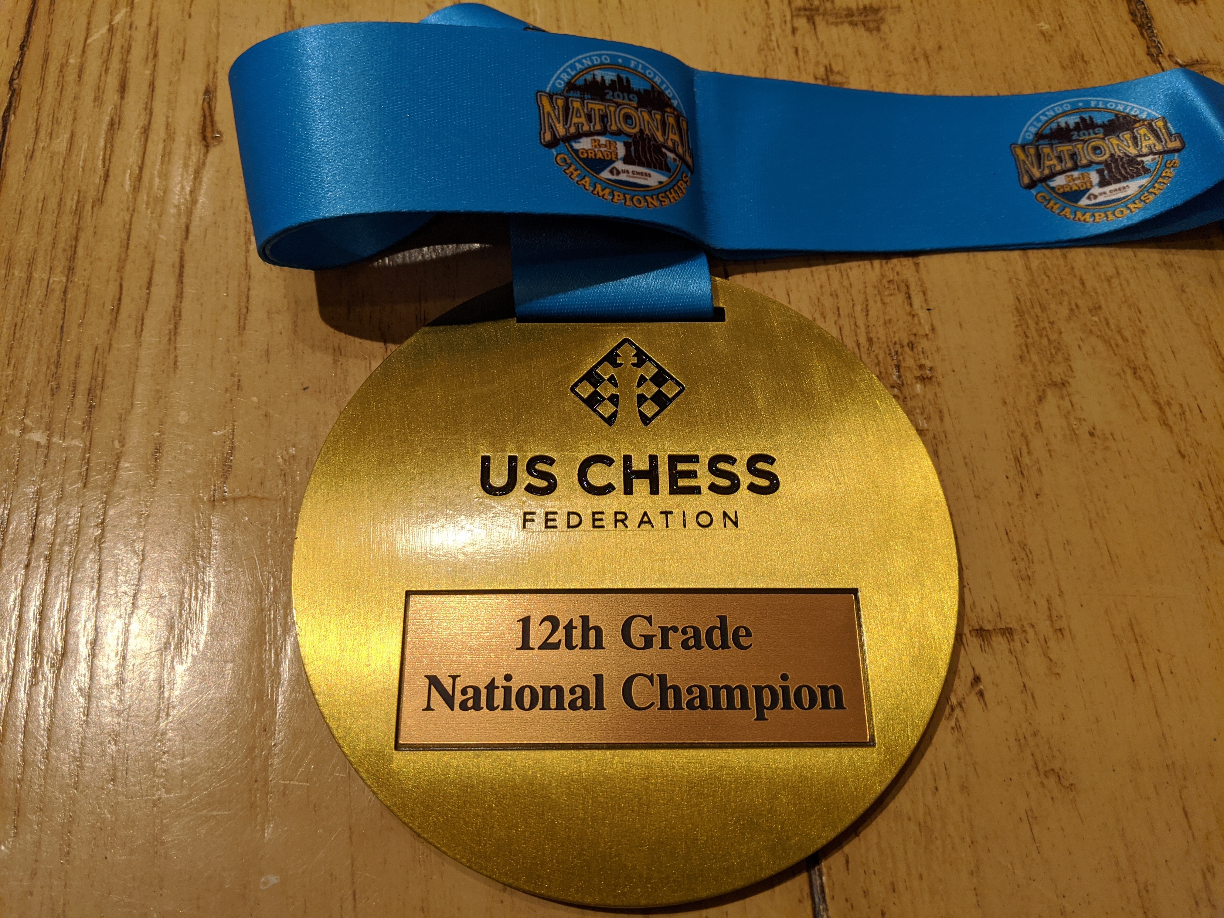 Express Medals Chess Championship Champ Chain Trophy Award with a Center Plaque Plate Measuring 6 by 5.25 Inches and Includes a 34 Inch Chain with Black Velvet Presentation Bag.